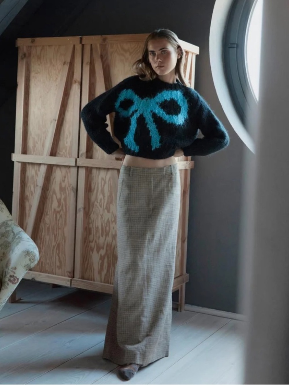 Designer sweater Cropped Black Crewneck Sweater with Blue Bow Motif size small